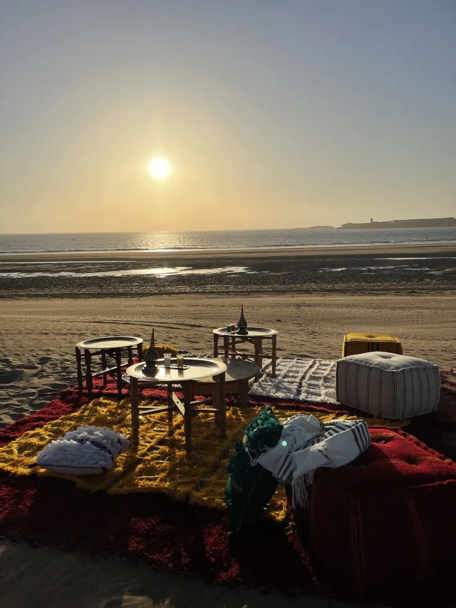 Sunset over the rooftop terrace at Riad Amana